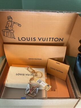 Louis Vuitton Gold and Cream LV Charm Keyring with Branded Pouch